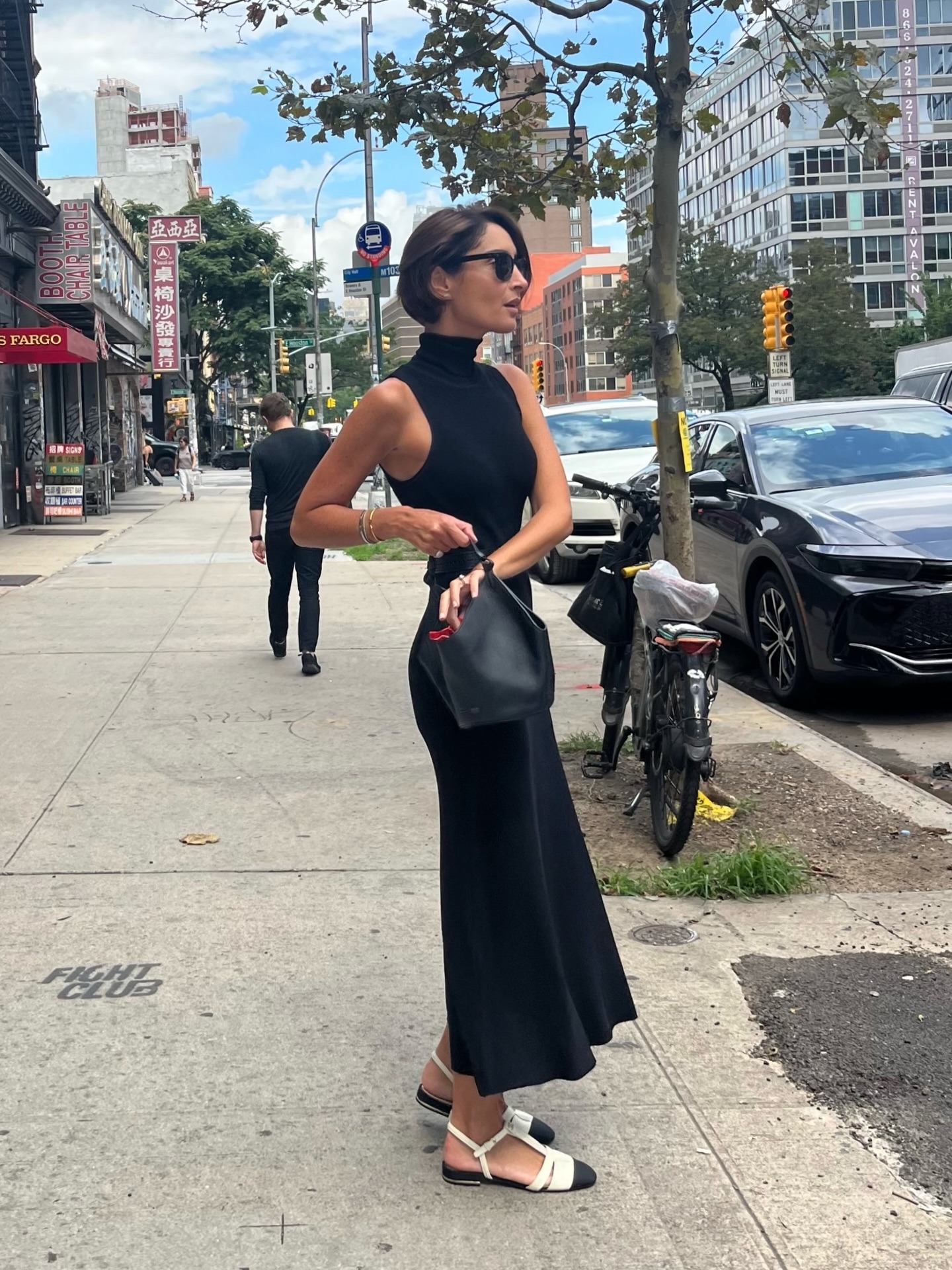 @erinoffduty wearing one of the non flip flop summer sandal-trends 2026