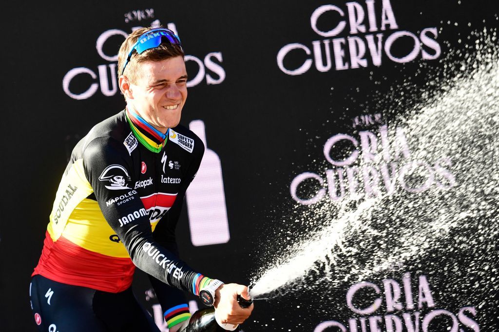 Team Quick Steps Belgian rider Remco Evenepoel celebrates on the podium winning the stage 14 of the 2023 La Vuelta cycling tour of Spain a 1562 km race between SauveterredeBearn and Larra Belagua on September 9 2023 Photo by Ander GILLENEA AFP Photo by ANDER GILLENEAAFP via Getty Images