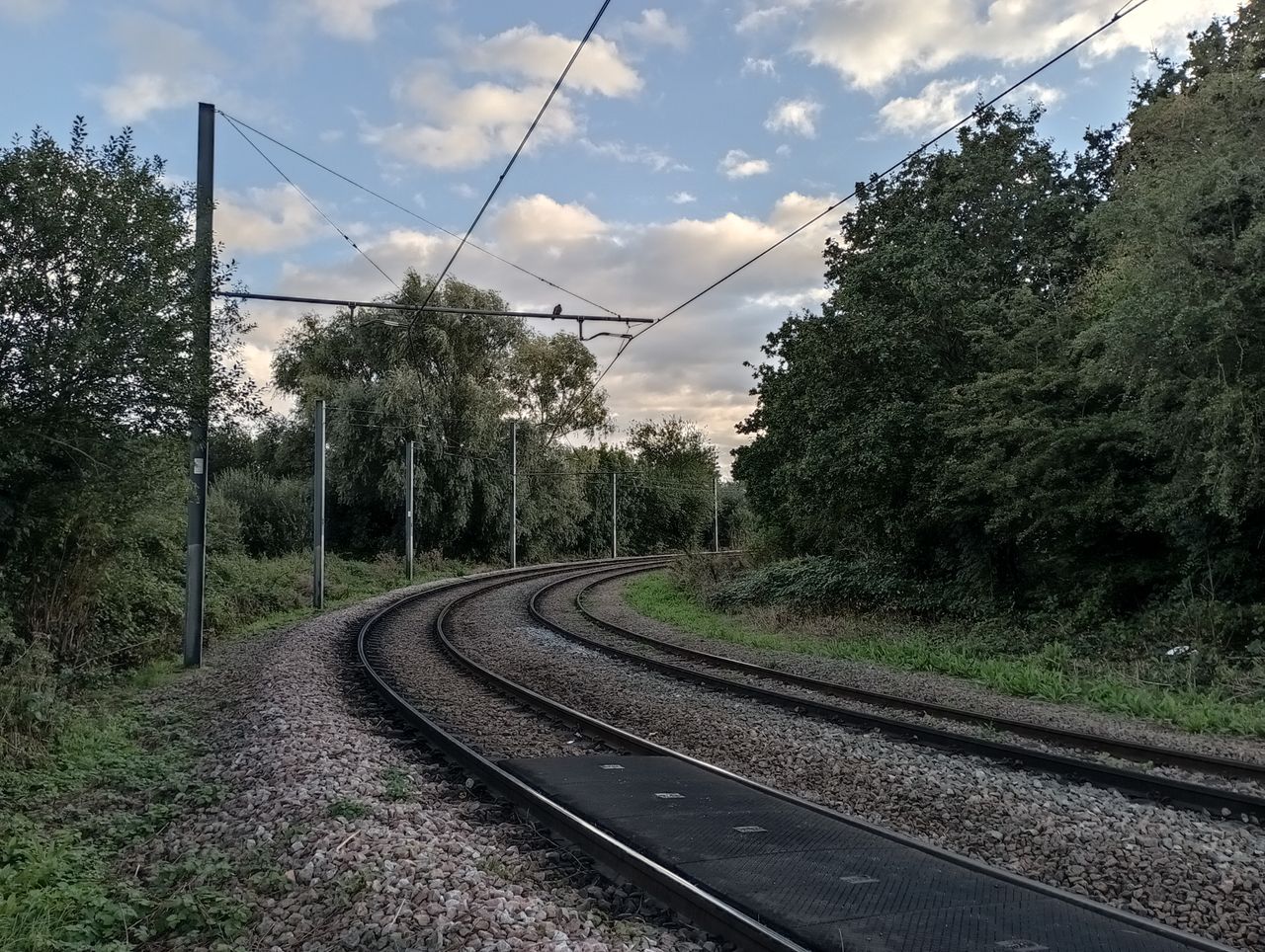 A Redmi 10 camera sample showing a train line