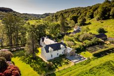 The farmhouse features five bedrooms and is a short distance from the Euchar Glen.