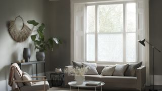 window film on sash windows in living room