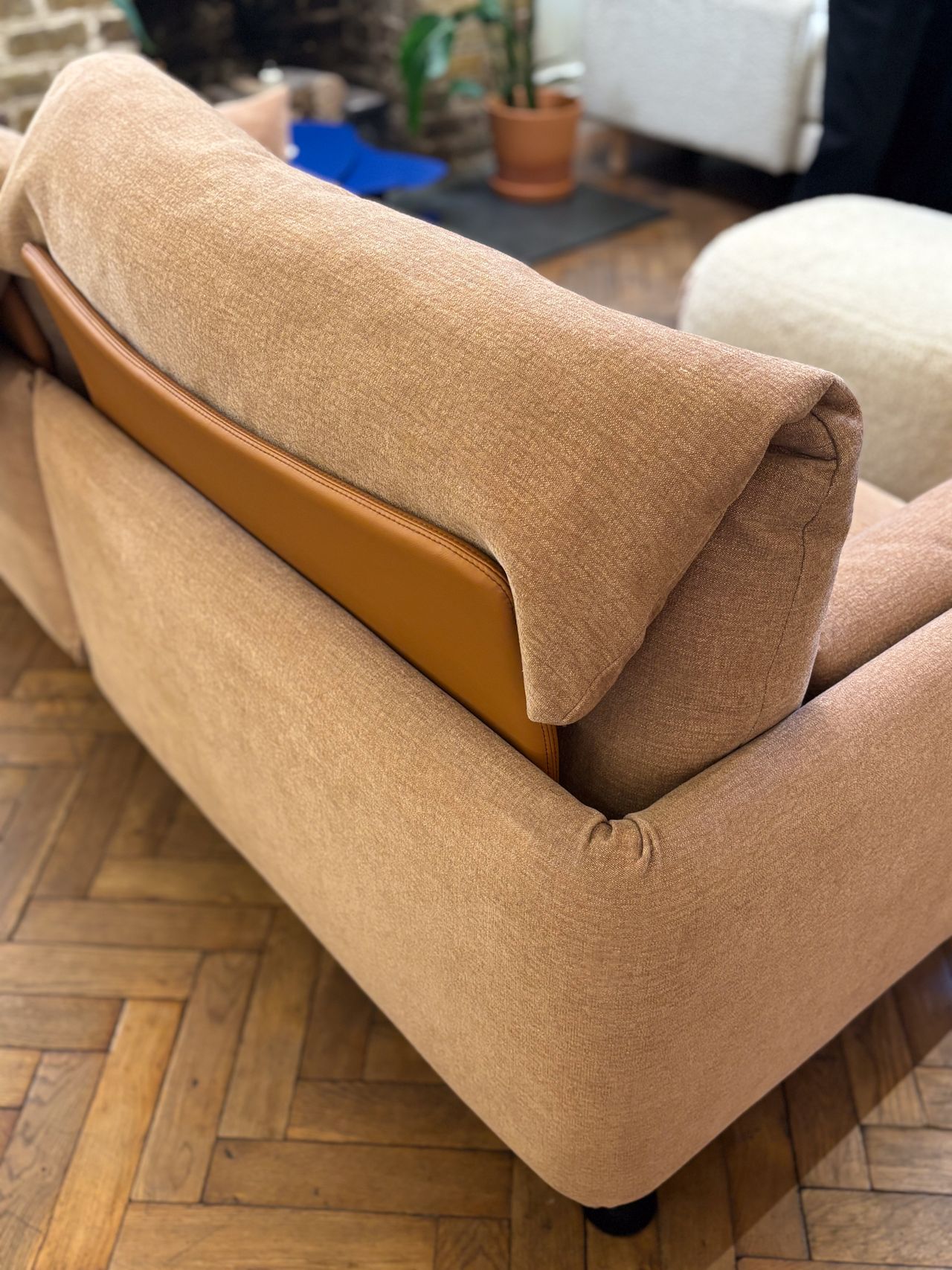 a light pink sofa in a furniture showroom