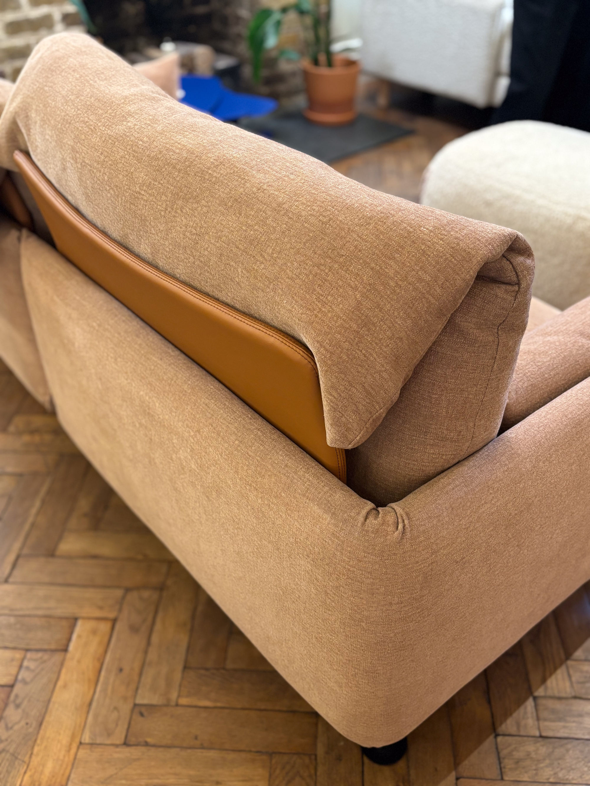 a light pink sofa in a furniture showroom