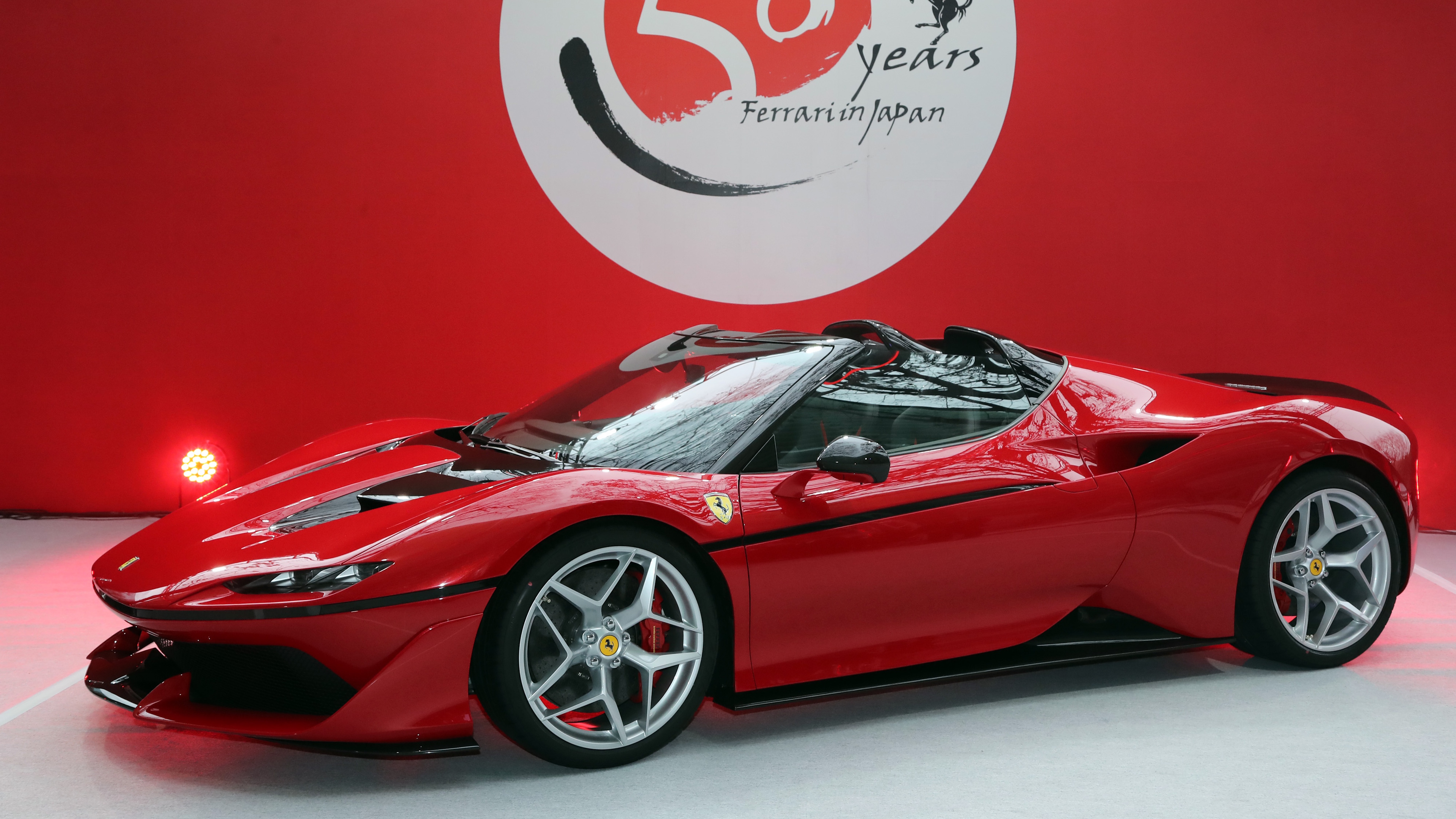 Italian sports car maker Ferrari displays the new vehicle Ferrari J50 at the world premiere in Tokyo on December 13, 2016 to celebrate Ferrari's 50th anniversary in Japan. Ferrari J50 has 690-horsepower 3.9-litter V8 turbo charged engine to drive roadster body. (Photo by YOSHIKAZU TSUNO/Gamma-Rapho via Getty Images)
