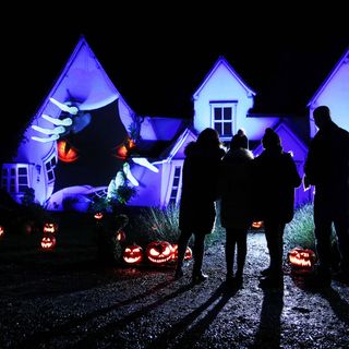 haunted house with halloween and pumpkins