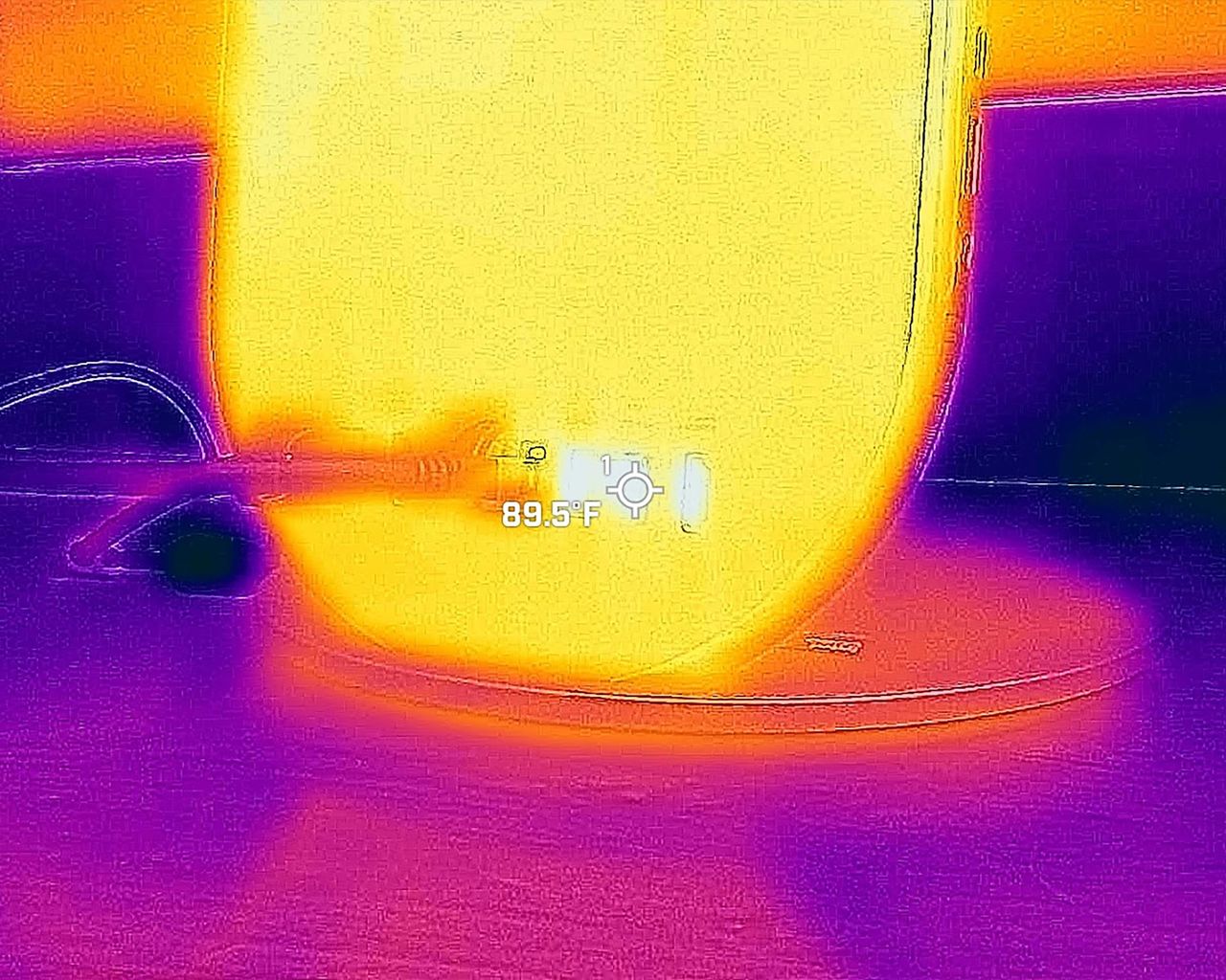 Images taken with a thermal camera focusing on the Lenovo Yoga AIO 27"'s back ports.