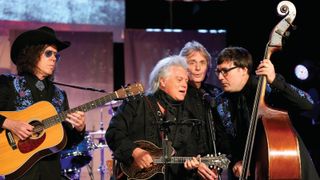 Marty Stuart performs at Country Music: Live at the Ryman, with Vince Gill.