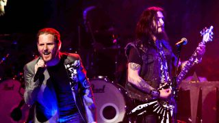 Slipknot’s Corey Taylor and Machine Head’s Robb Flynn performing onstage together in 20112