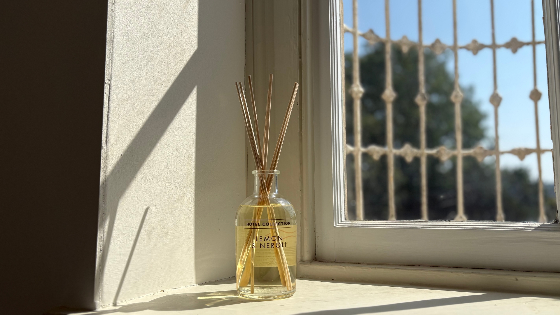 Aldi Lemon and Neroli Hotel Collection diffuser on the windowsill