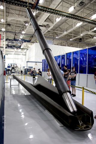 The Falcon Heavy was designed to be reusable. Both the center core and the side boosters carry landing legs, which will land each core on Earth after takeoff.