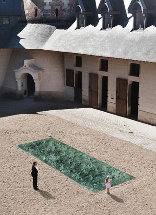 Birdseye view of green marble outside of castle