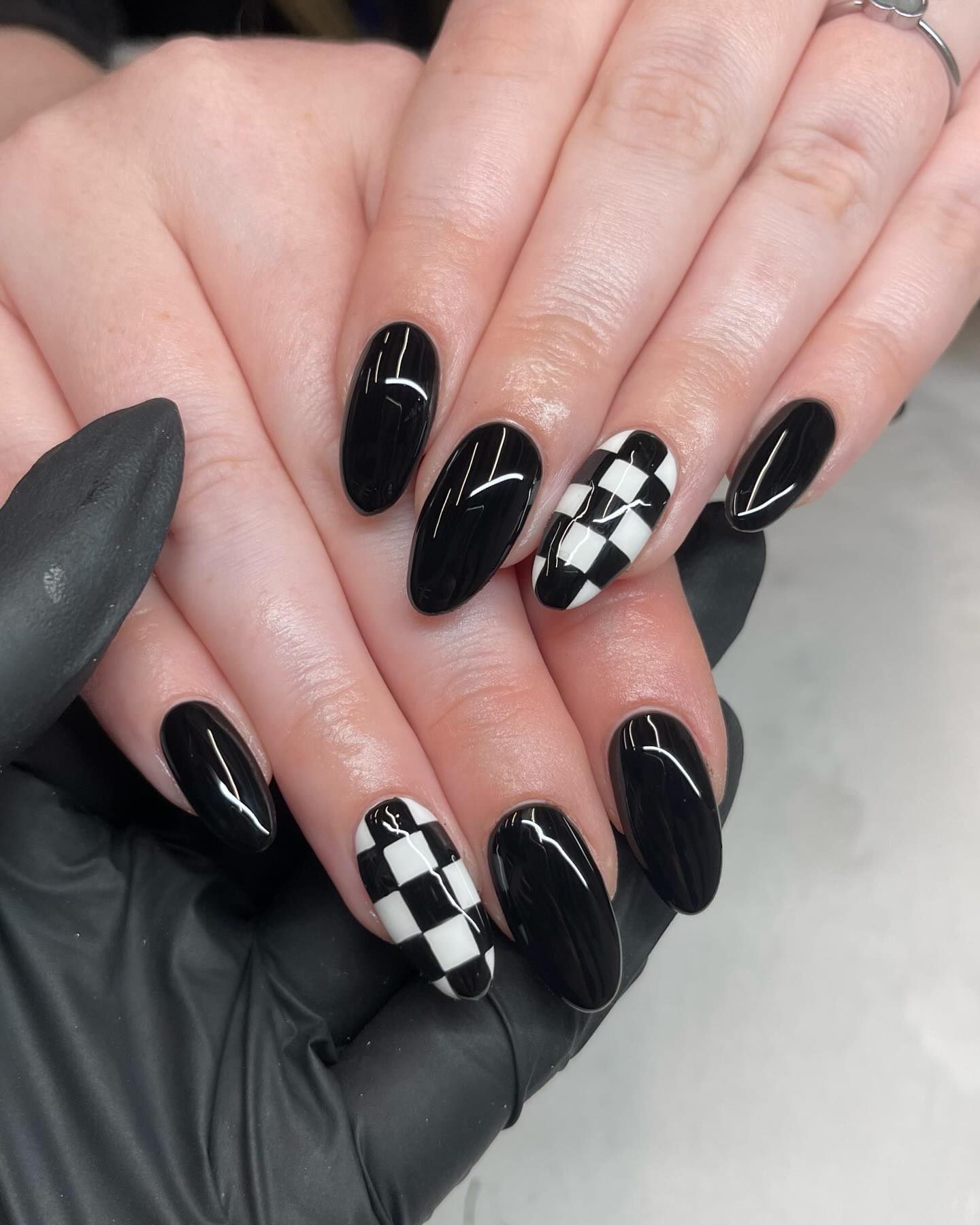 Black nail polish manicure design.