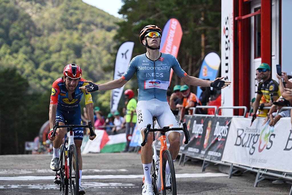 PINEDA DE LA SIERRA, SPAIN - AUGUST 05: Oscar Onley of Great Britain and Netcompany INEOS Cycling Team (R) celebrates at finish line as stage winner ahead of Giulio Ciccone of Italy and Team Lidl - Trek (L) during the 48th Vuelta a Burgos 2026, Stage 2 a 178km stage from Arcos de la Llana to Pineda de la Sierra 1478m on August 05, 2026 in Pineda de la Sierra, Spain. (Photo by Antonio Baixauli/Getty Images)