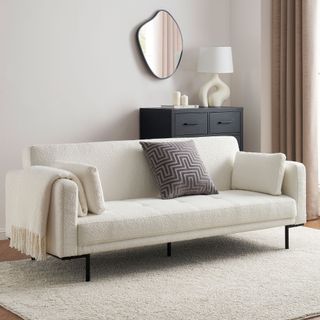 White click clack sofa bed in white room