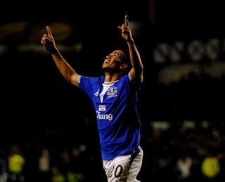 Steven Pienaar of Everton celebrates scoring the opening goal during the UEFA Europa League Round 32 first leg match between Everton and Sporting Lisbon on February 16, 2010 in Liverpool, England.