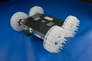 Sand Flea is an 11 pound robot that drives like an RC car on flat terrain, but can jump 30 ft into the air to overcome obstacles. 