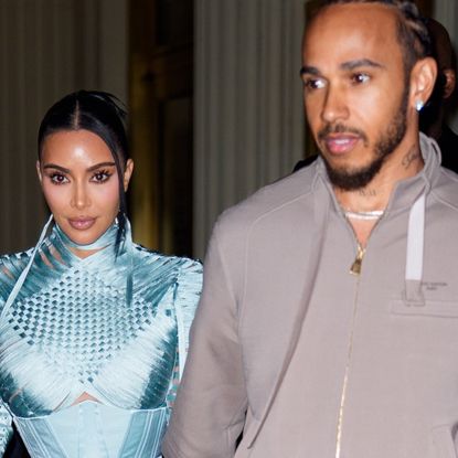 Kim Kardashian wore a cool-blue corset with high-rise jeans as her date night outfit