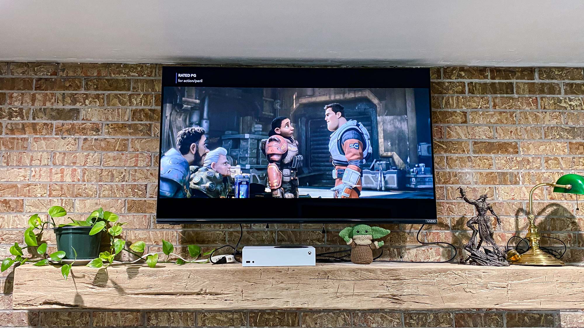 Vizio M-Series Quantum X 50” Class 4K TV hung on wall in living room