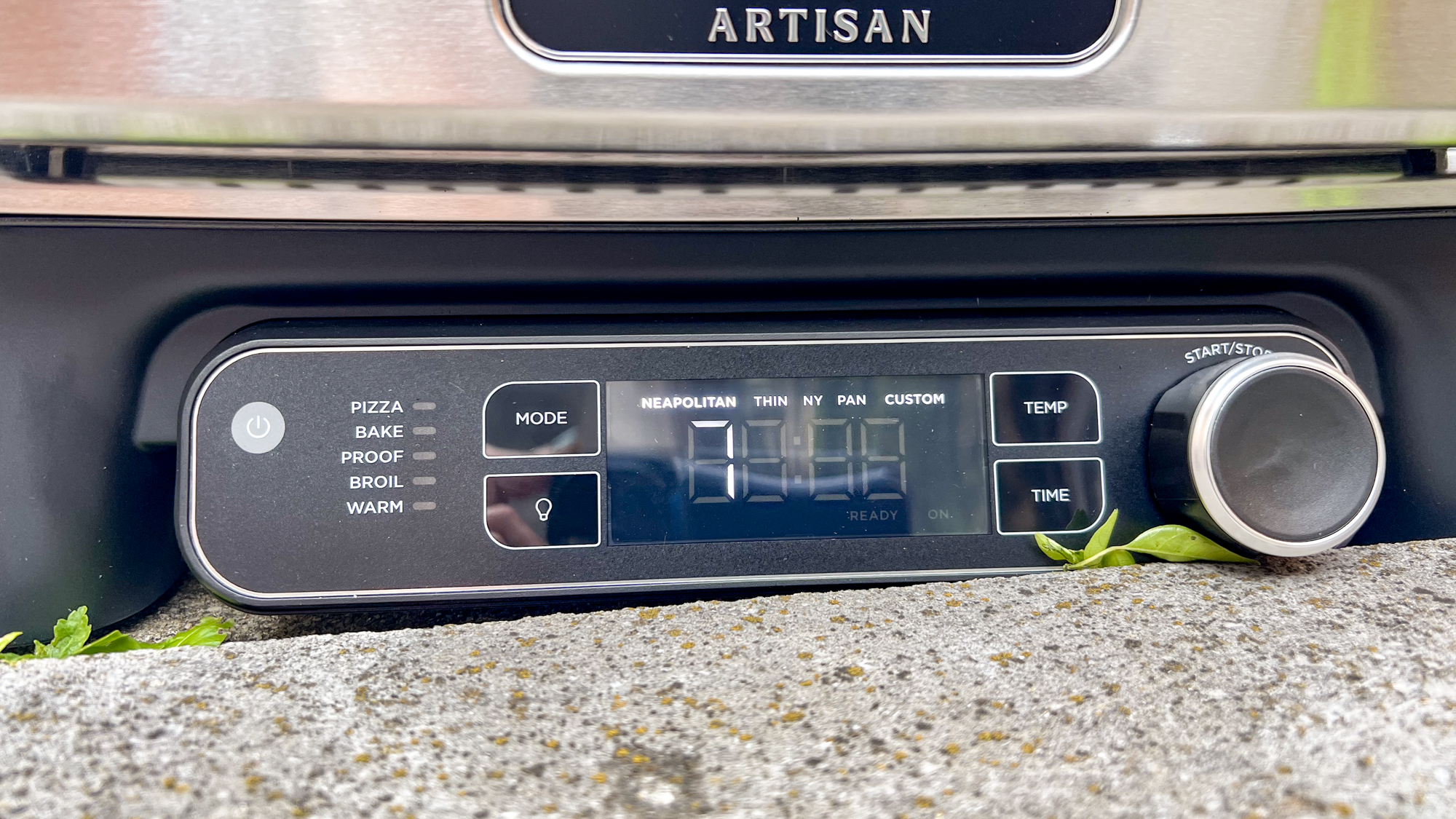 Ninja Artisan Outdoor Pizza Oven in a back yard