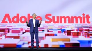 Adobe President of Digital Experience Anil Chakravarthy speaking at Adobe's 2023 Summit 