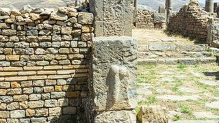 A similar phallus carving in a wall at the ancient Roman city of Timgad in modern day Algeria.