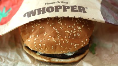A Burger King Whopper burger in a bun