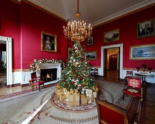 Adornments can be seen in the Red Room where white paper doves carry messages of peace