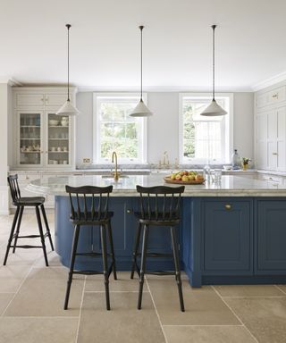 kitchen with blue kitchen island