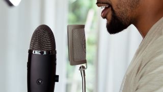 Blue Yeti X microphone with branded pop filter