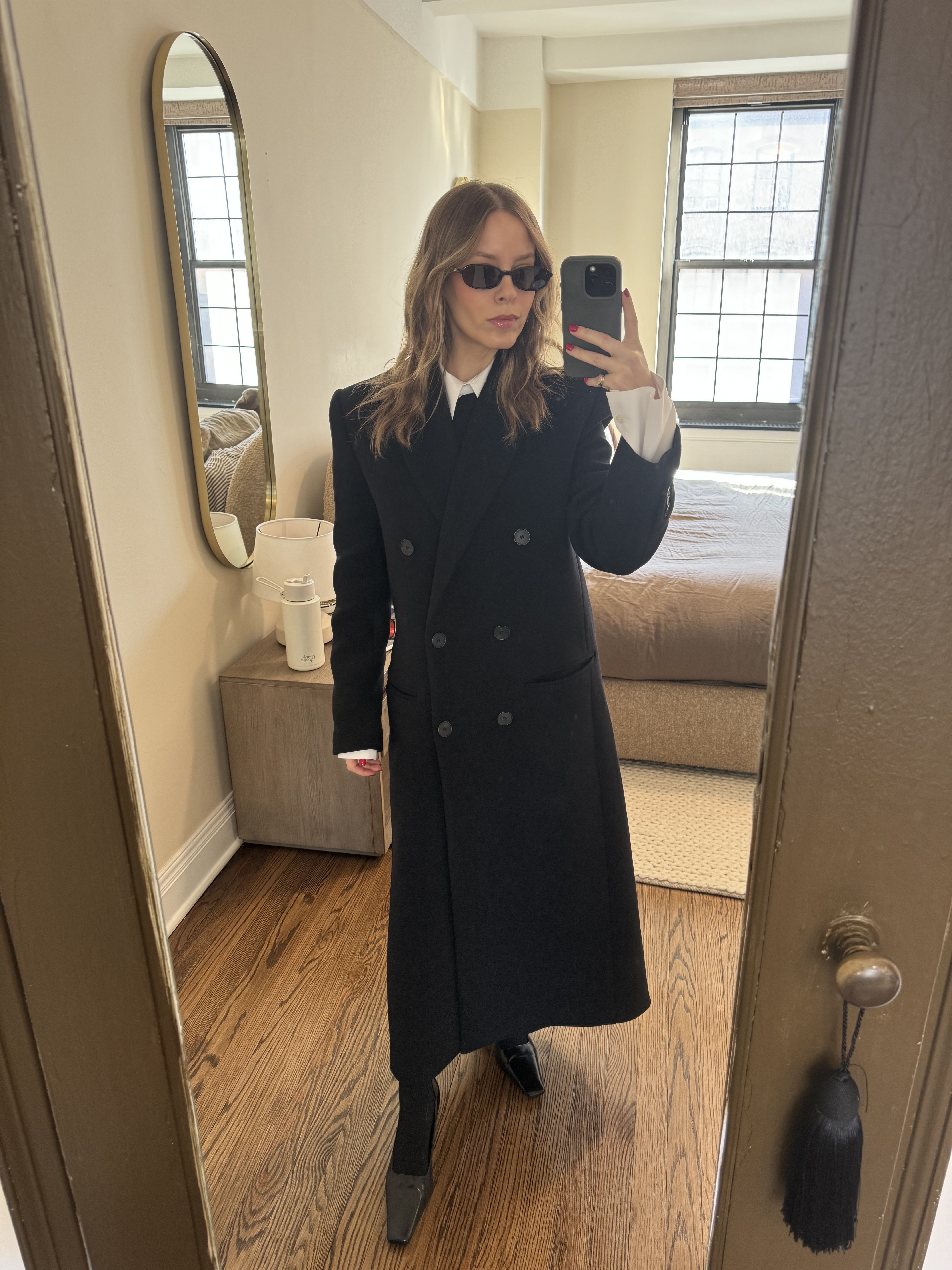 Nikki wears a the row-inspired cashmere tights outfit.