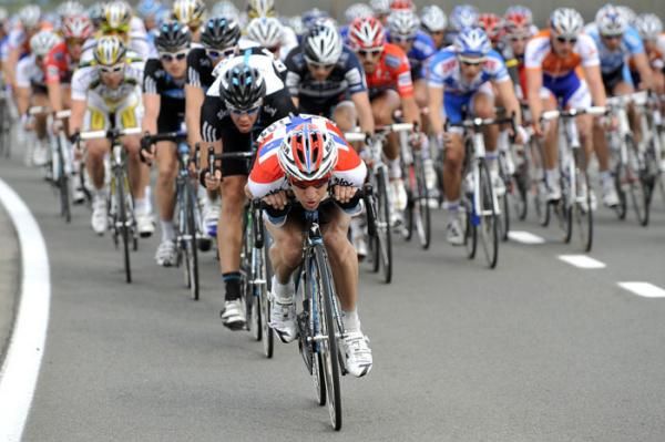 Kurt-Asle Arvesen (Sky) gets aero at the head of the peloton.