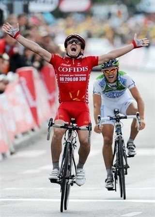 Samuel Dumoulin (Cofidis) wins stage three of the Tour into Nantes.