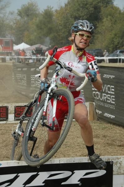 Kym Facsewski (Grace Law-Trek) hops over the barriers.