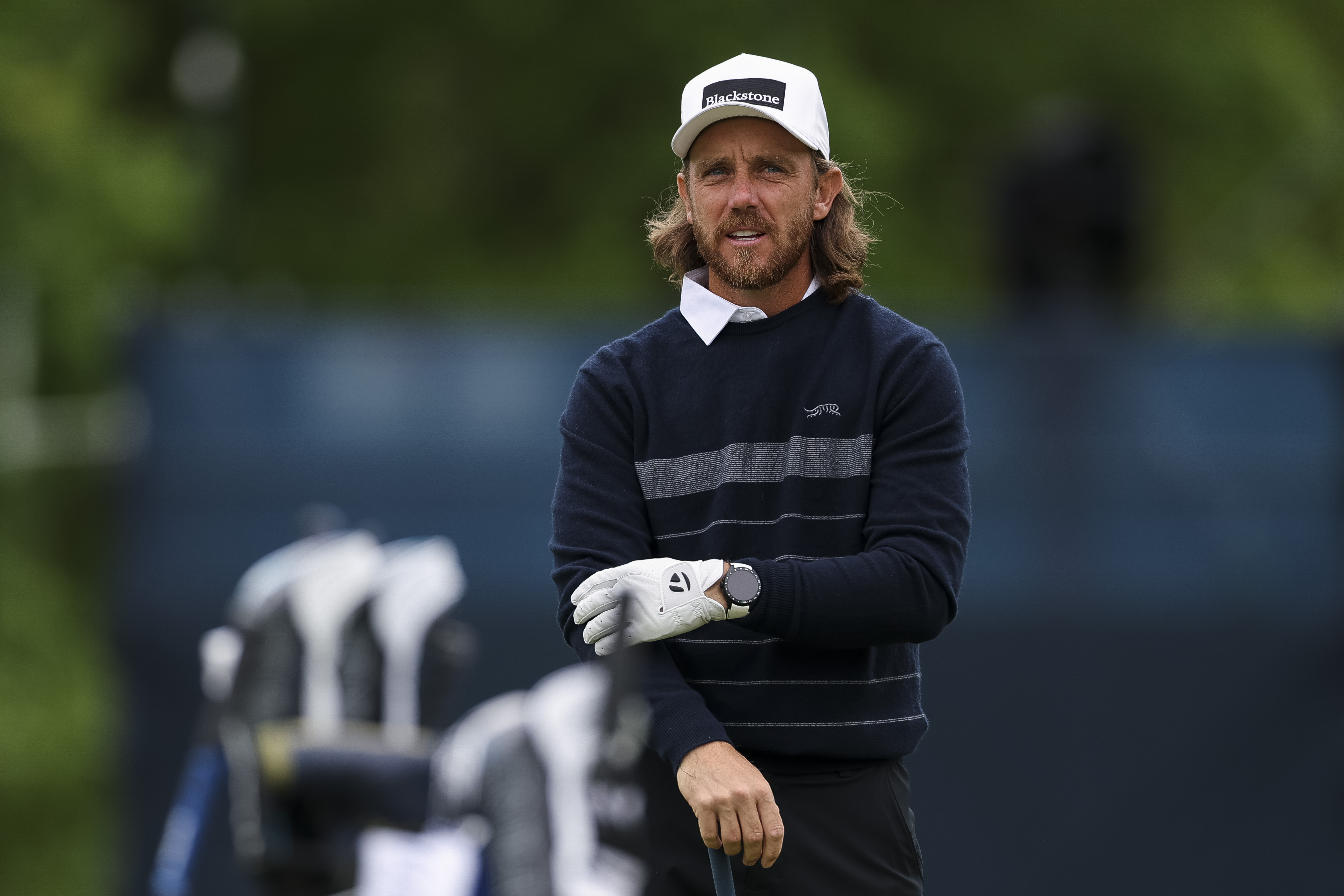 Tommy Fleetwood warms up on the driving range before a practice round prior to the PGA Championship at Aronimink Golf Club