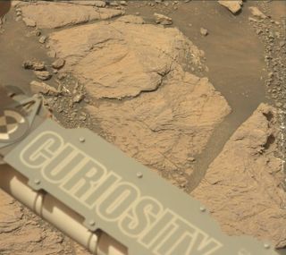 The Curiosity rover captured this photograph of itself and its surroundings on Mars on Feb. 10, 2019, before a temporary glitch paused the craft's science activity.