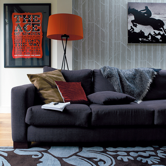 living area with blue sofa and frame