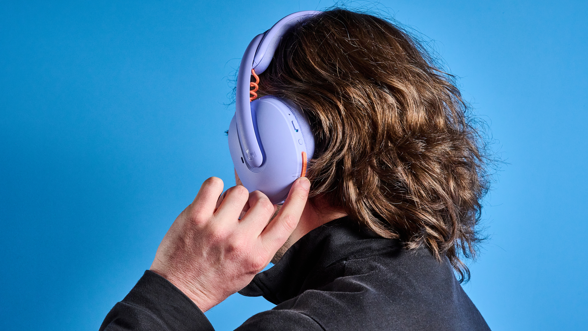 A lilac Logitech G325 Lightspeed wireless gaming headset