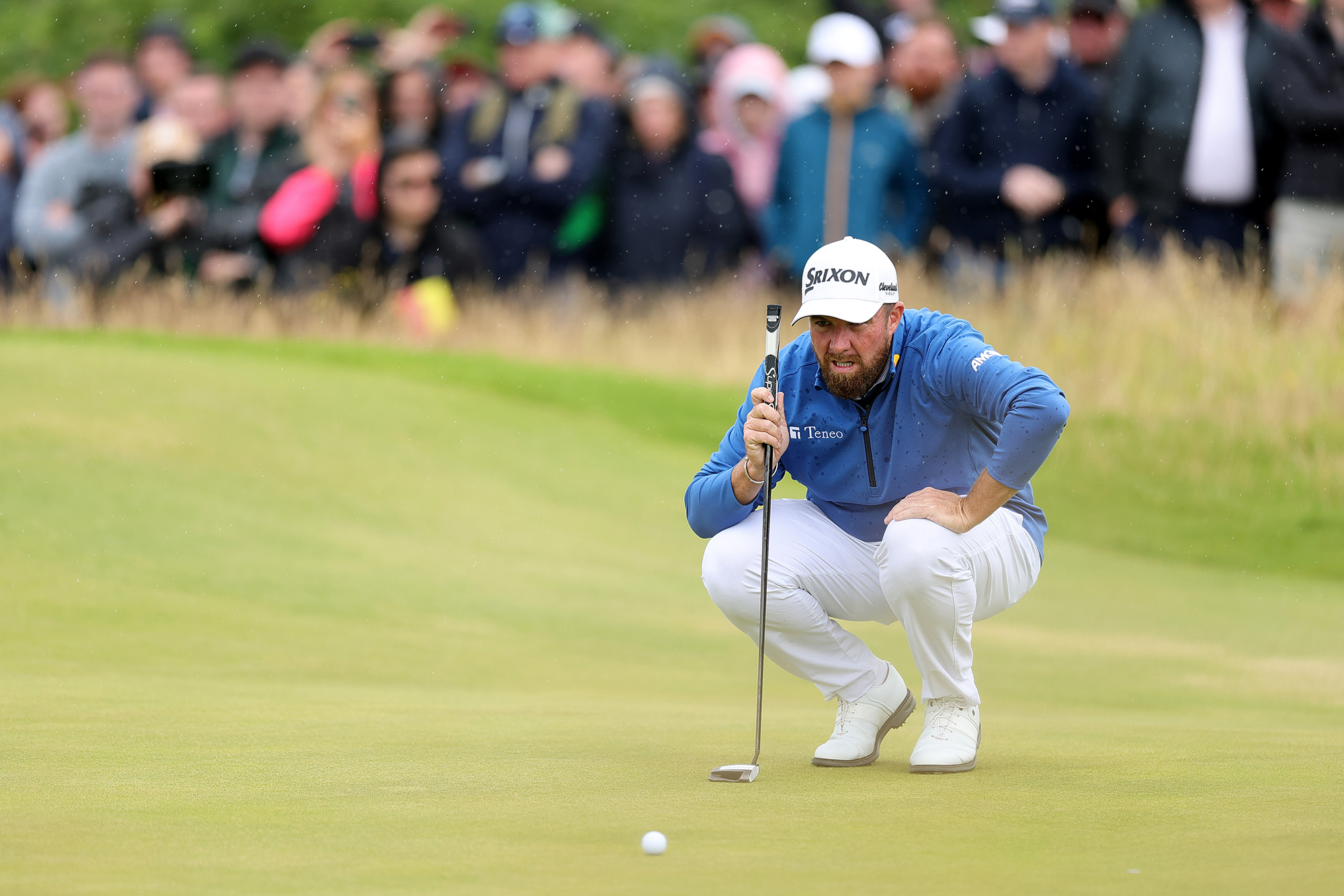 Shane Lowry reading a putt on the green at Royal Portrush