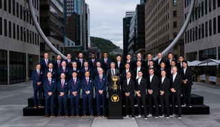 The US and international teams pose for a team photo at the Presidents Cup Gala