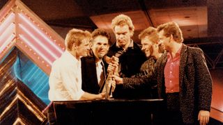 Bryan Adams accepting a Juno with his band in 1985 for Reckless