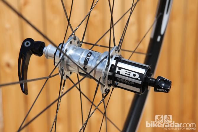The HED Ardennes Plus SL rear hub features lubrication ports for both the axle bearings and freehub body for easy maintenance.