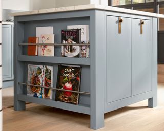Kitchen island with integrated book rack at end