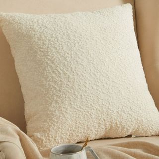 A Mainstays Square Boucle Ivory Pillow
