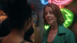 Screenshot of Bela talking to random character at party in Sex Lives of College Girls Season 3 finale