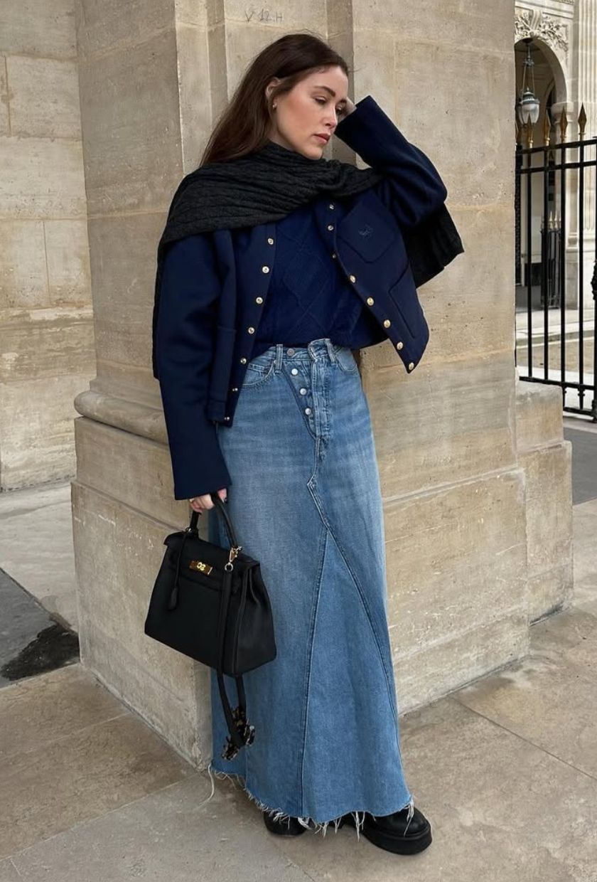 @annabelrosendahl wears a navy jacket, jumper, denim maxi skirt and chunky loafers