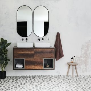 wooden wall hung vanity in white bathroom