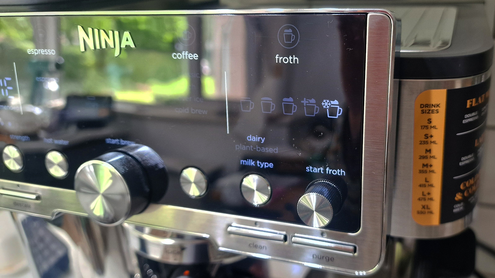 Ninja Luxe Café Pro being tested in a green and white kitchen