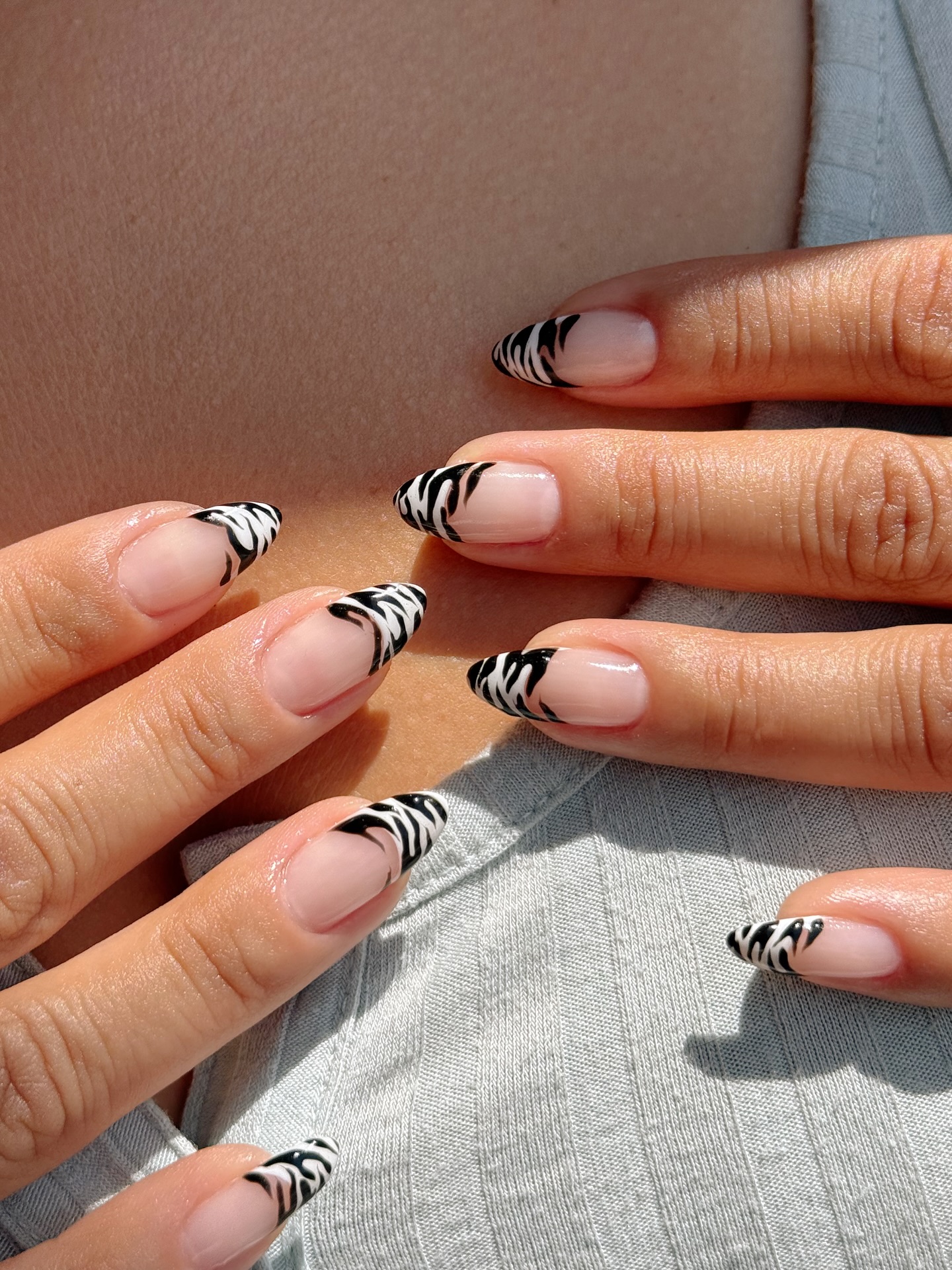 Nail Art by Queenie zebra print french tips black nail art design