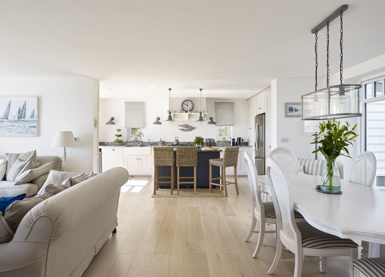 open plan kitchen and living area in new england style home