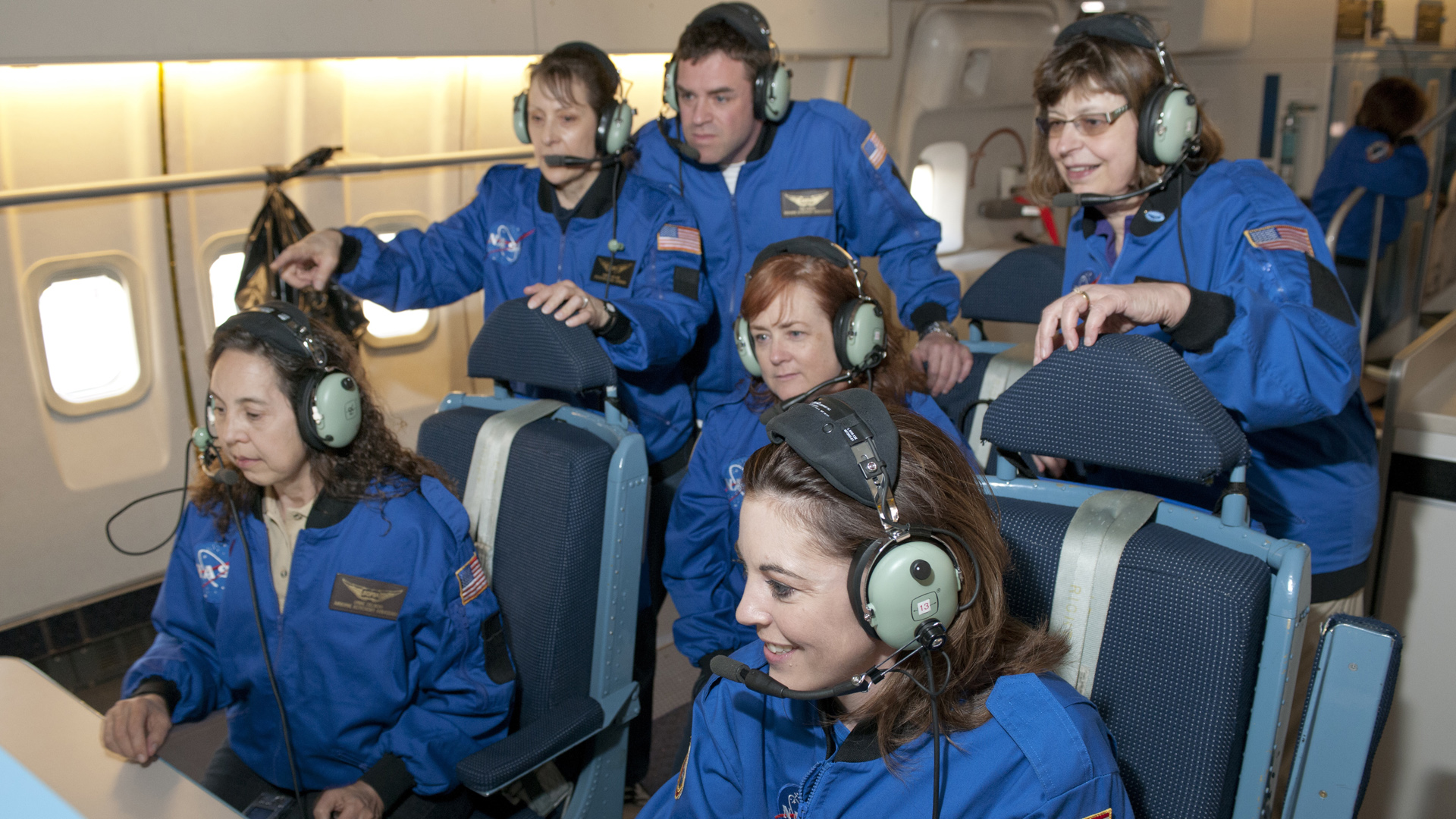 A group of science teacher flying on NASA's SOFIA observatory.